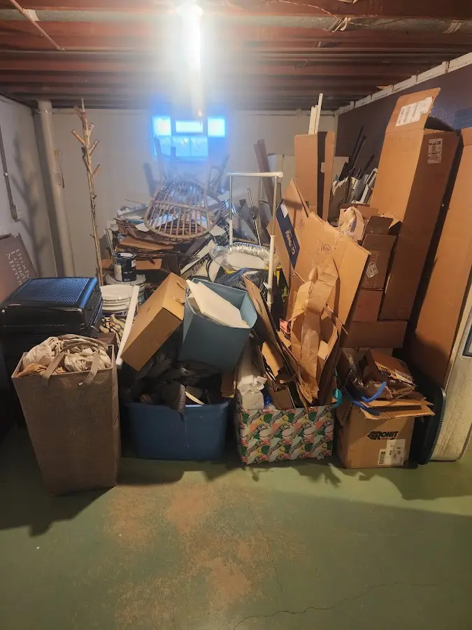 Roll-off dumpster container at job site for 2 Yard Dumpster Rental in Quincy